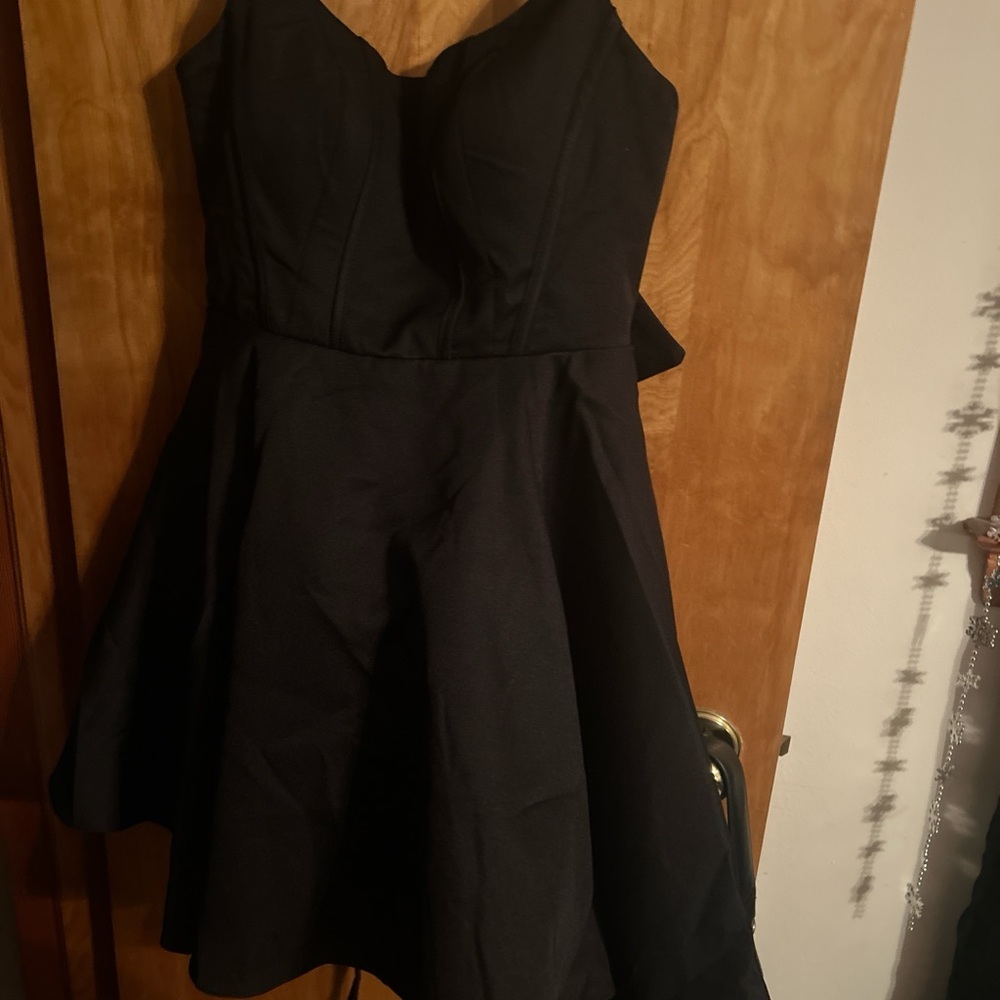 Brand new never worn black partial lace up dress with bow